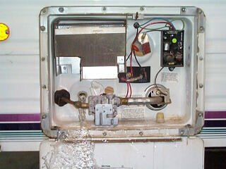 Drain the water heater tank.